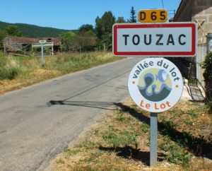 Panneau du village de Touzac dans le Lot
