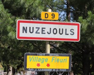 Communes - Nuzéjouls - - Panneau du village de Nuzéjouls